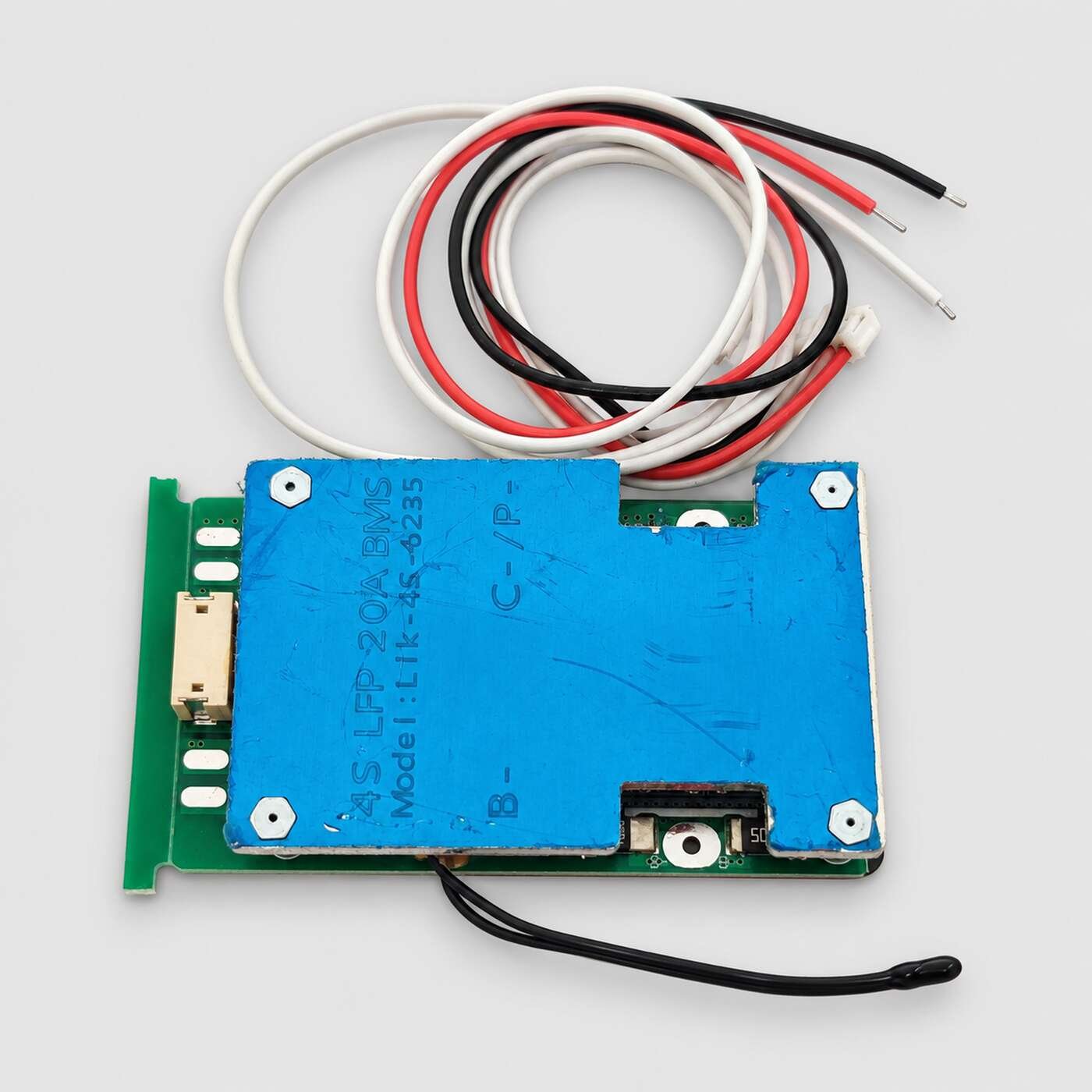 EIK-4S-6235-4S-20A-BMS-under-100KB EIK-4S-6235 4S 20A LiFePO4 BMS with blue protective casing, five-wire sensing harness, connector, bare leads and temperature sensor.